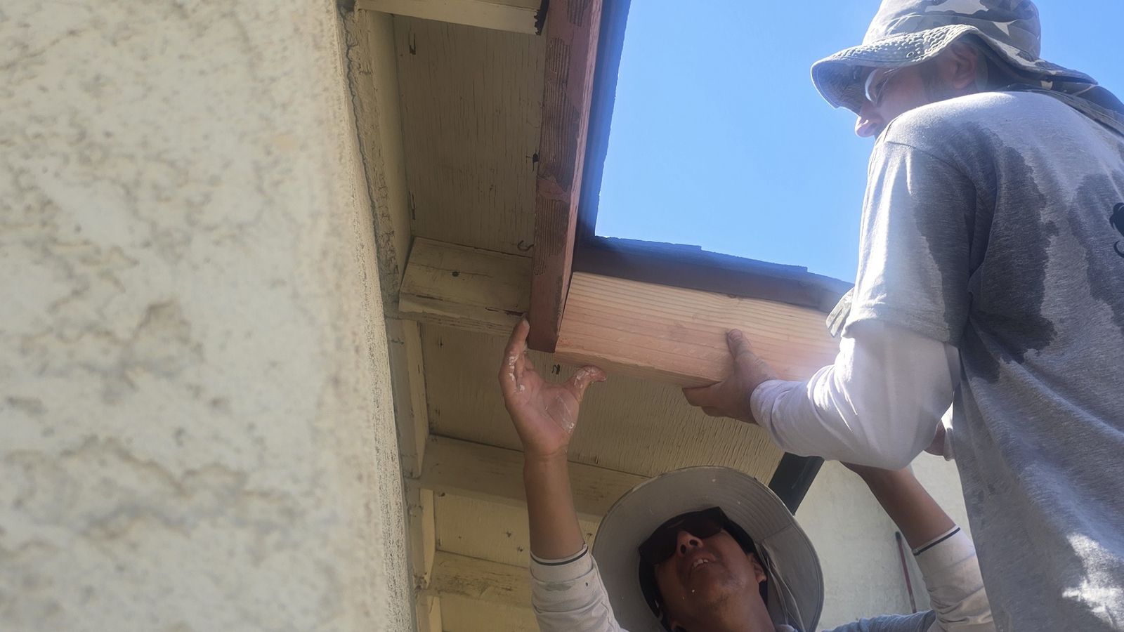 Crew replacing fascia and trim